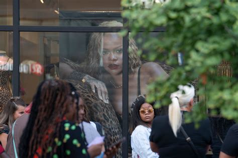 Shoppers line up for Rihanna's Savage X Fenty store opening in .